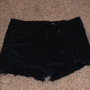 black ripped jean shorts